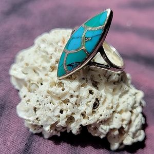 Vintage sterling silver ring with genuine turquoise.